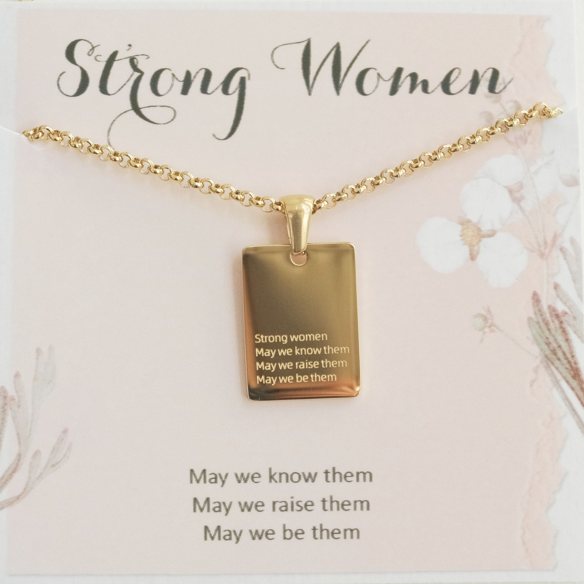 a gold necklace with a quote on it