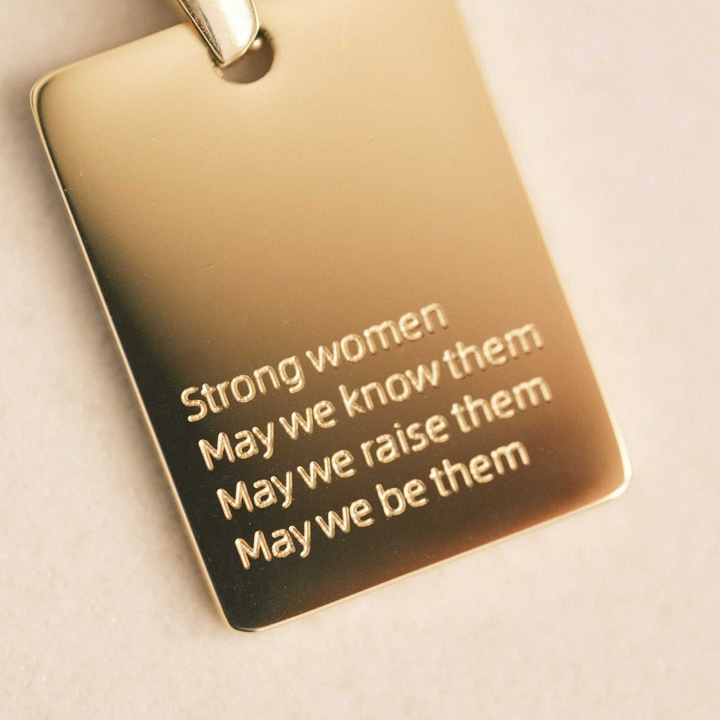 a necklace with a quote written on it