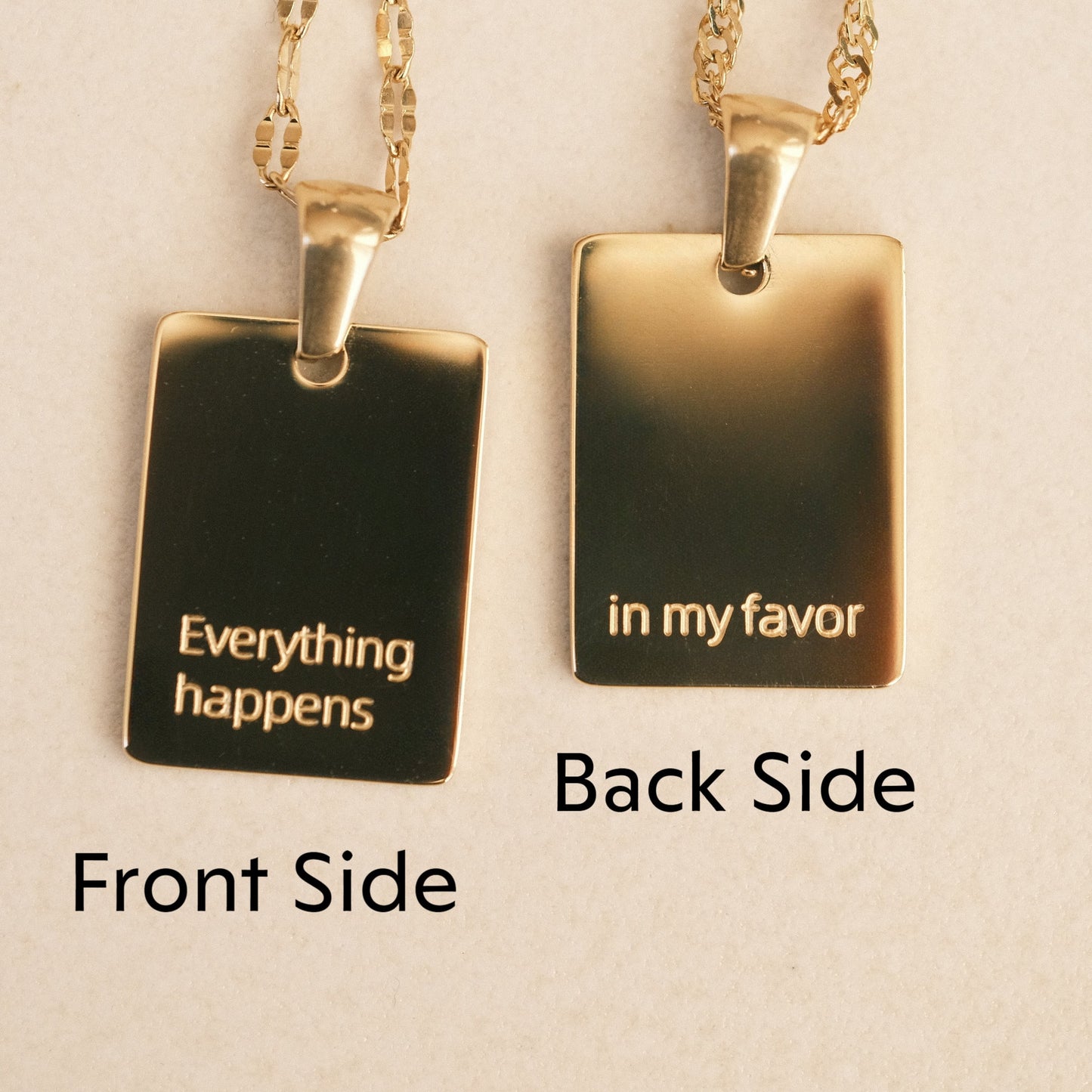 a couple of necklaces that have words on them